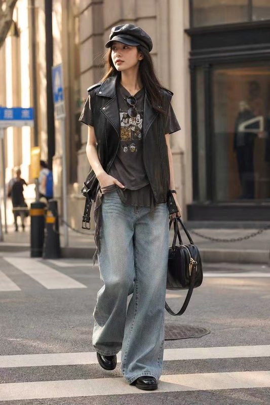 A young woman wearing the outfit on a city street